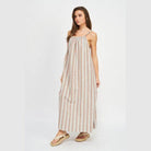 Emory Park vacation maxi dress featuring a striped design and adjustable spaghetti straps