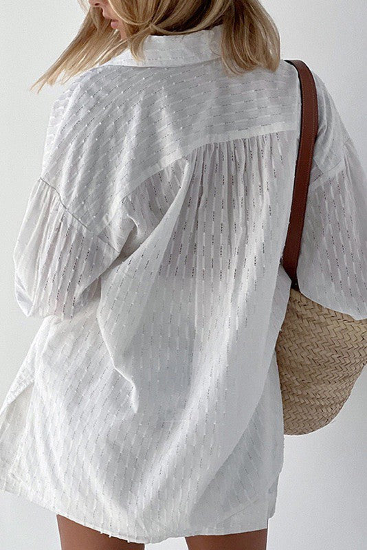 Miss Sparkling white textured long sleeve dress perfect vacation outfit for women with a woven bag