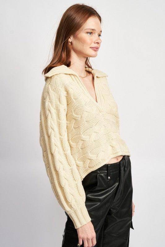Emory Park Women's Cable Knit Sweater in Cream, perfect for vacation outfit ideas during cooler days