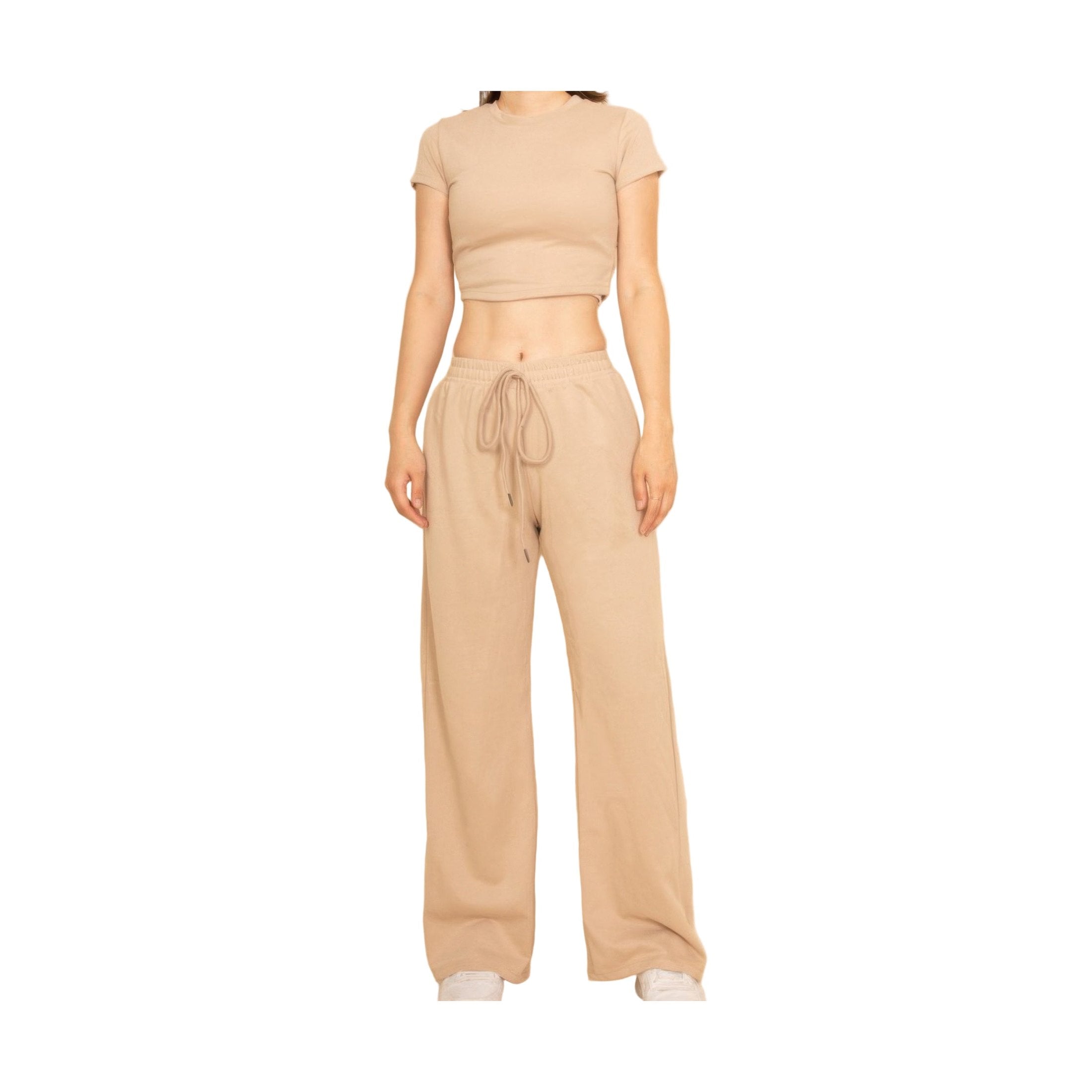 Beige two-piece vacation outfits for women featuring a crop top and wide-leg pants