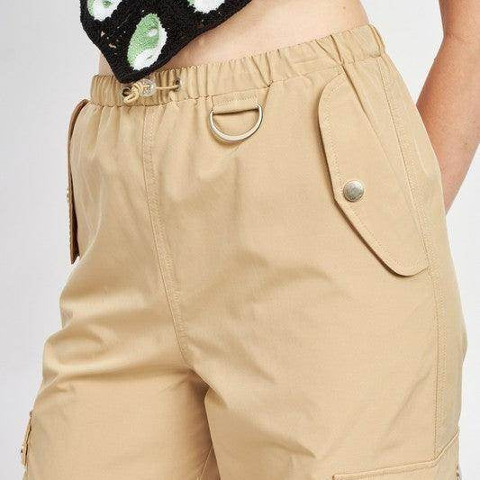 Emory Park Women's vacation style cargo pants in beige with cargo pockets and adjustable waistband