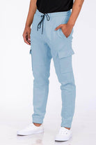 Men's WEIV vacation style cargo pants in light blue with practical pockets and a comfortable fit