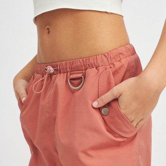 Emory Park women's vacation style cargo pants in pink with side pockets and stretchy waistband