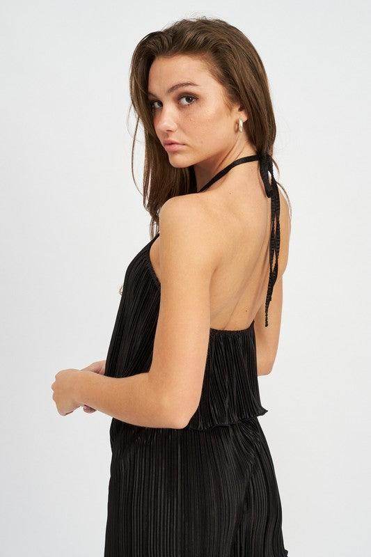 Black pleated women's vacation style crop tops with a halter neck design from Emory Park