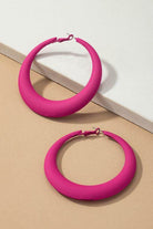 Bold pink vacation style earrings with a modern curved design for a stylish look