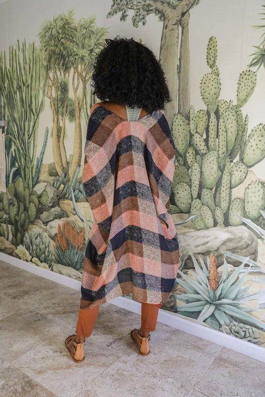 Cozy women's vacation style kimono with plaid pattern, perfect for layering and warm weather outfits