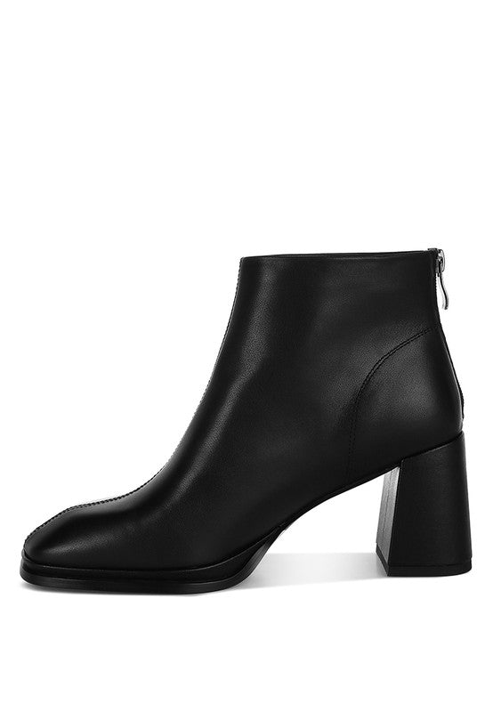 Rag Company vacation style leather boots with a block heel and sleek black design
