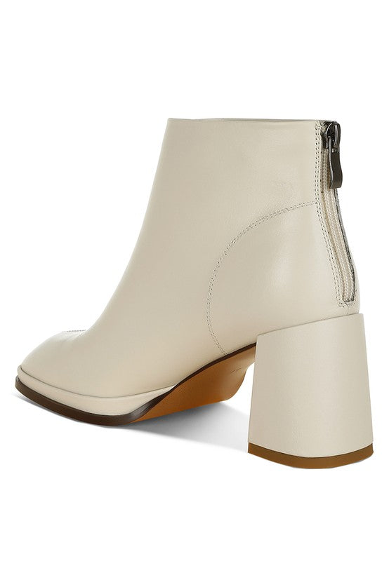 Rag Company women's vacation style leather boots in cream with a chunky heel and zip closure
