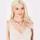 Bella Chic vacation style necklace layered with a star pendant, perfect for summer outfits