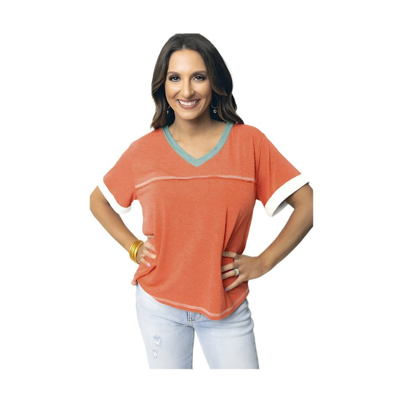 YNIQUE vacation style womens t-shirt in orange with contrasting green neckline and white sleeve cuffs