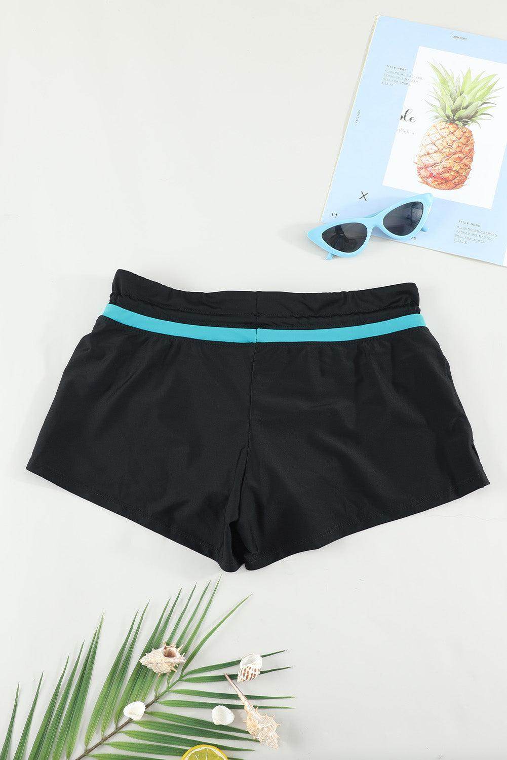 Trendsi vacation swim shorts for women in black with a stylish turquoise waistband