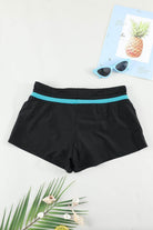Trendsi vacation swim shorts for women in black with a stylish turquoise waistband