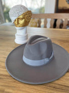 Queens INC vegan felt panama hat in gray with a stylish wide brim and elegant ribbon band