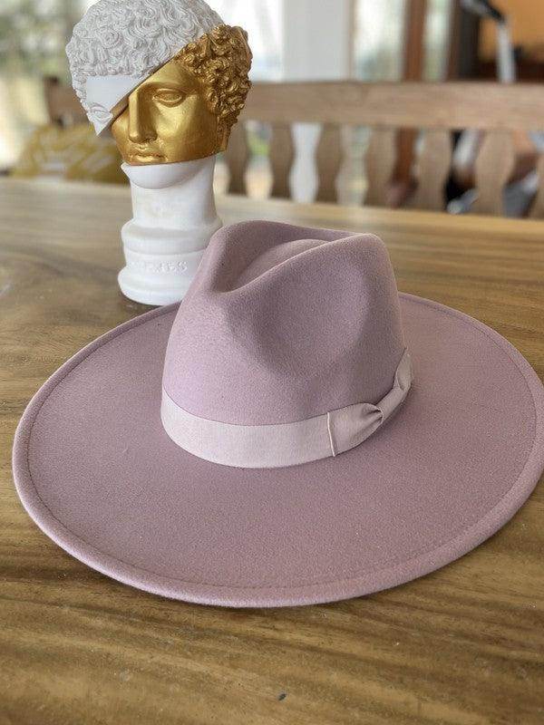 Light pink vegan felt panama hat with a stylish ribbon band, perfect for summer outfits
