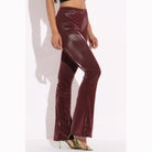 VacationGrabs women's velvet PU flared pants clubwear in shiny burgundy with high waist fit