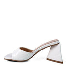 Stylish white block heel vacation sandals with a sleek open-toe design for warm weather wear