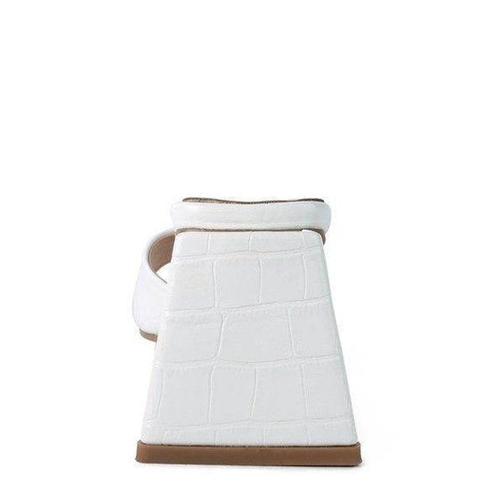 White block heel vacation sandals with a stylish design for comfortable summer wear