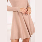 Lilou women's casual knit dress for travel in soft beige with a flared skirt and long sleeves
