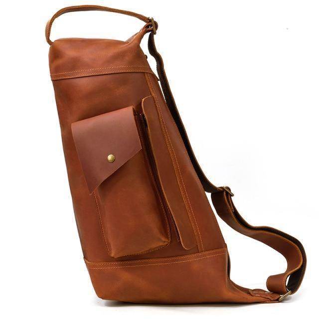 Stylish leather travel backpack for men featuring a sleek design and multiple pockets