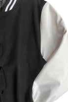 WEIV Letterman jacket for men with black body and white sleeves, perfect for casual outings