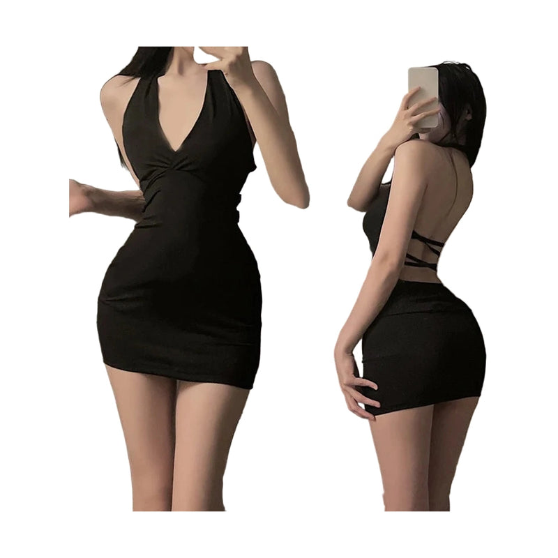 Woman wearing a little black dress for night out with halter neck and open back design