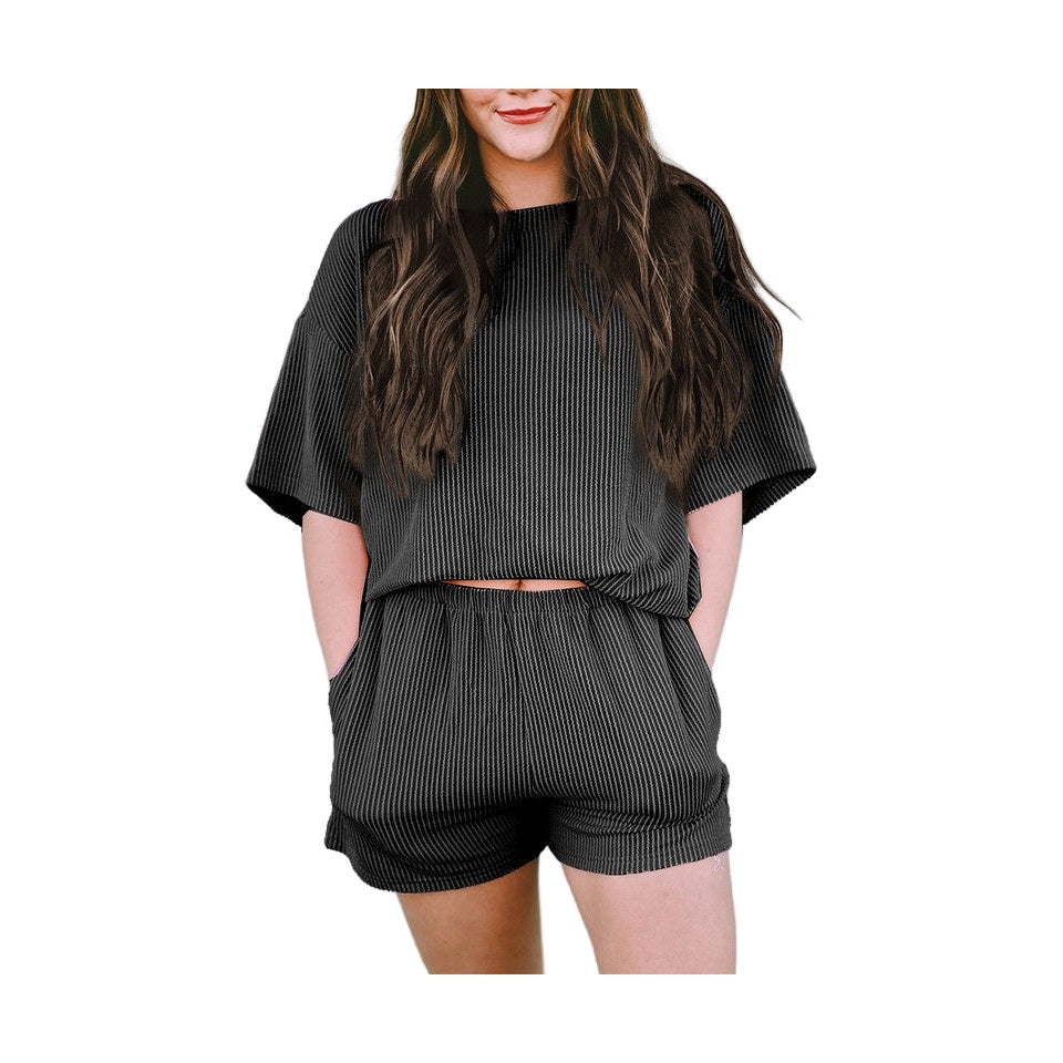 Black ribbed textured matching set for women featuring short sleeve top and elastic waist shorts