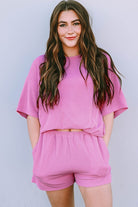 Pink ribbed textured matching set for women with short sleeves and shorts by SHEWIN INC