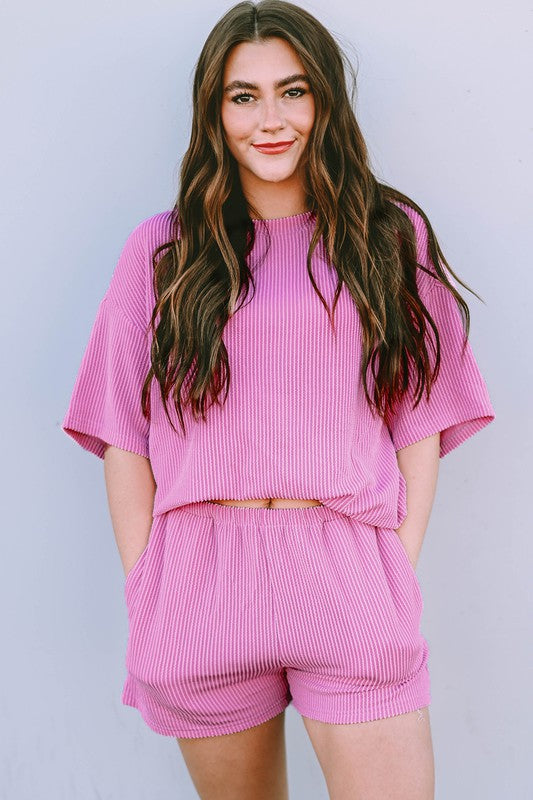 Pink ribbed textured matching set for women with short sleeves and shorts by SHEWIN INC