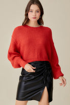 Mustard Seed red knit sweater paired with black faux leather skirt trendy sweater tops for women