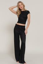 Vacation casual two piece set with black short sleeve crop top and wide leg pants for women