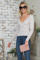 Andante USA women's versatile jersey top with a flattering v-neck and long sleeves, styled with jeans