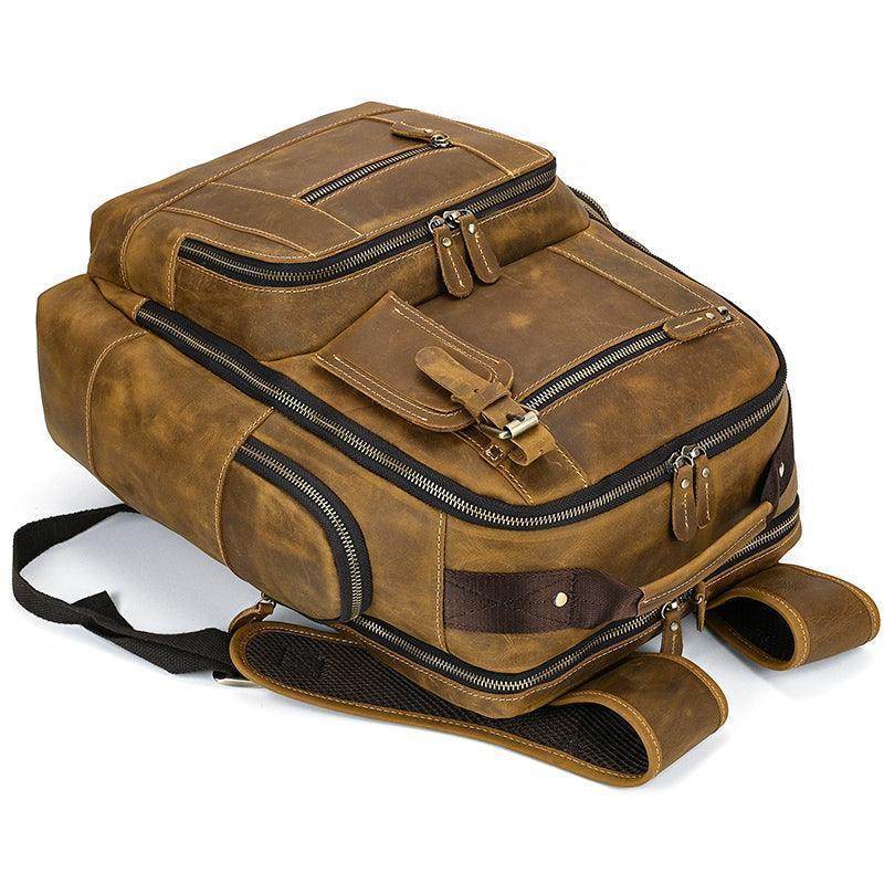Vintage leather backpack from VacationGrabs with multiple compartments and a durable design