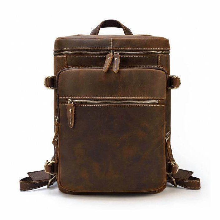 Vintage leather backpack by VacationGrabs with multiple compartments for travel and daily use
