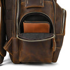 Vintage leather backpack with multiple pockets and a classic brown finish for travel enthusiasts