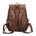 Vintage leather laptop backpack with adjustable straps and spacious interior for organization