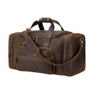 Vintage leather weekender bag with spacious compartments and sturdy handles for travel convenience