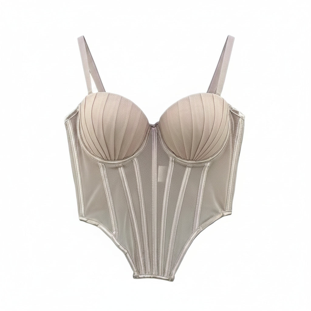 Beige sexy clubwear bustier shirt with structured cups and vertical panel detailing hanging on wooden hanger