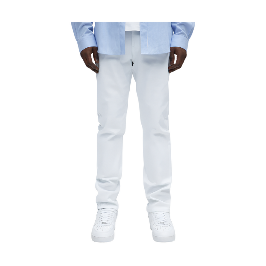 VacationGrabs white slim fit jeans for men styled with casual white sneakers and light blue shirt