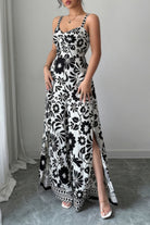 Stylish wide leg vacation jumpsuit with floral patterns and side slits for effortless summer elegance