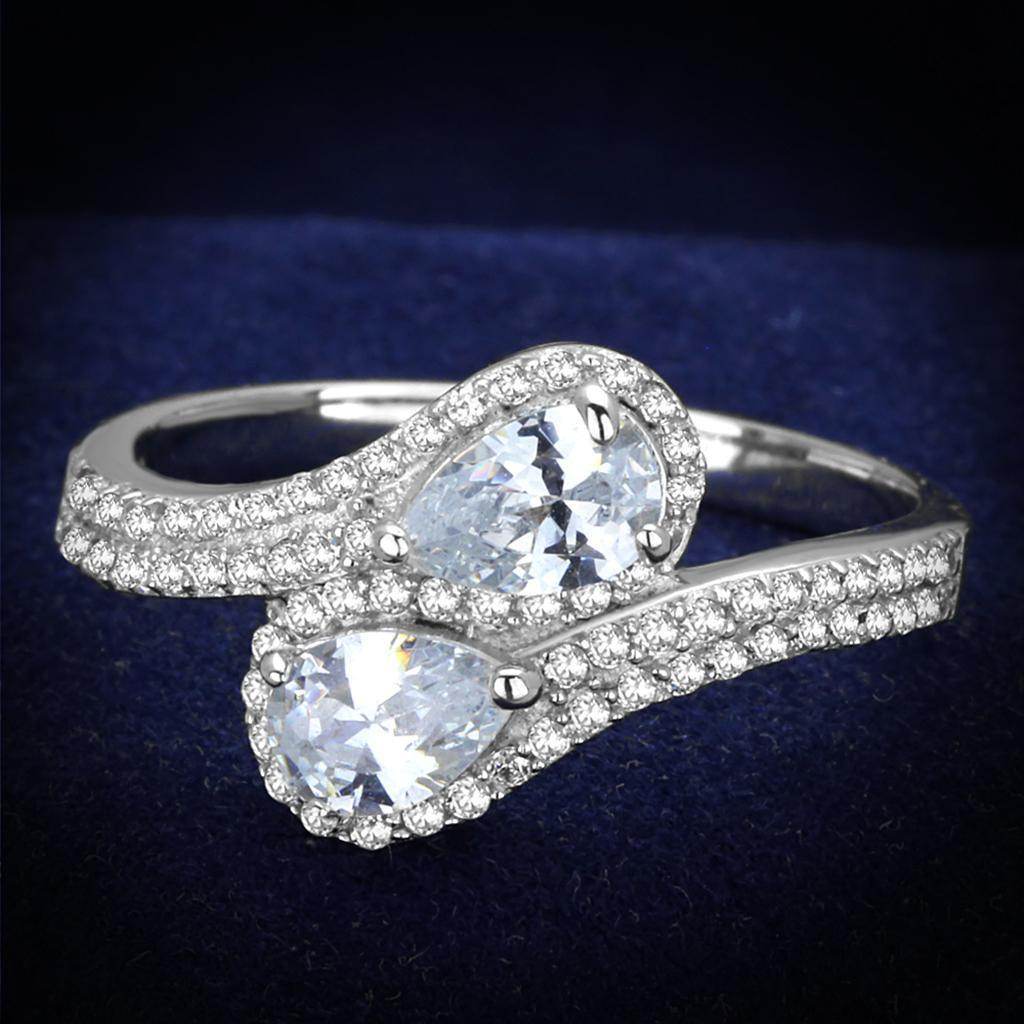 Stunning rhodium plated sterling silver fashion ring featuring two pear-shaped stones with sparkling accents