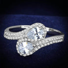 Stunning rhodium plated sterling silver fashion ring featuring two pear-shaped stones with sparkling accents