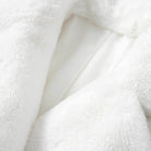 Soft and cozy white warm winter coat for women with plush fabric for added warmth and comfort