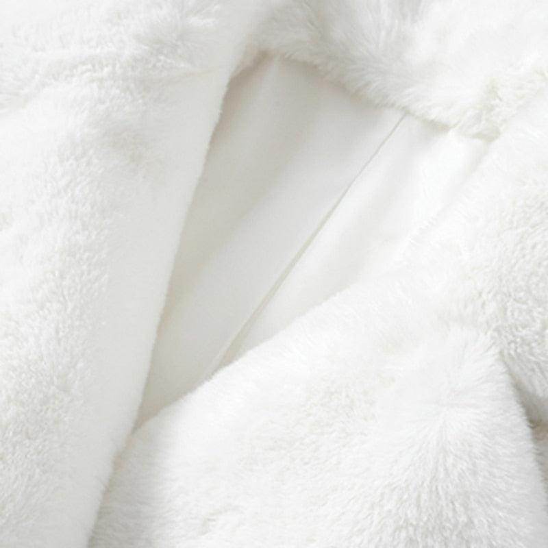 Soft and cozy white warm winter coat for women with plush fabric for added warmth and comfort