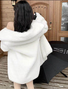 Cozy white warm winter coat for women with oversized design, perfect for chilly days