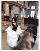 Cozy and stylish warm winter coat for women, perfect for cold weather outings with a furry companion