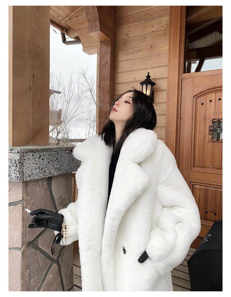 Stylish white warm winter coat for women with a plush texture and oversized collar for cold weather