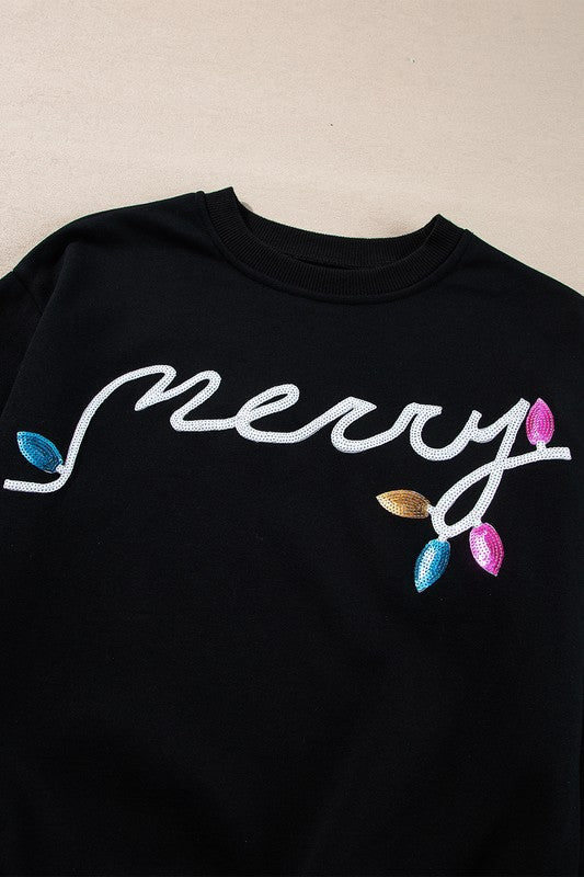 Black sweatshirt with merry embroidered text and colorful light bulb details womens cozy Christmas matching set