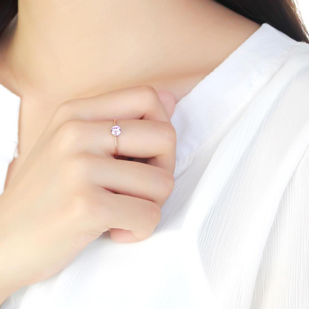Women's jewelry rose gold ring with purple gemstone for elegant occasions