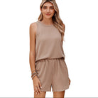Stylish beige womens sleeveless top and shorts set with subtle vertical stripes and relaxed fit