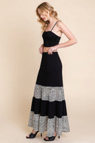 VacationGrabs womens velvet mesh fashion skirt in black with leopard print tiered design worn by model